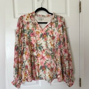 Aura long sleeved floral blouse.